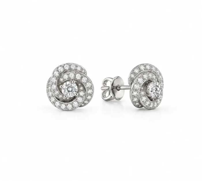 Diamond spiral stud earrings in white gold with a double circular halo and central diamond centerpiece